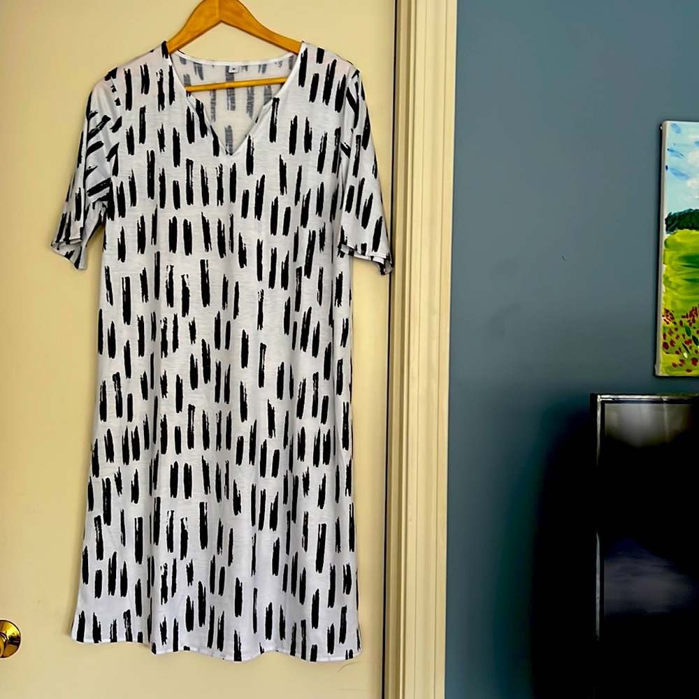 A line swing dress sleeve to elbow.